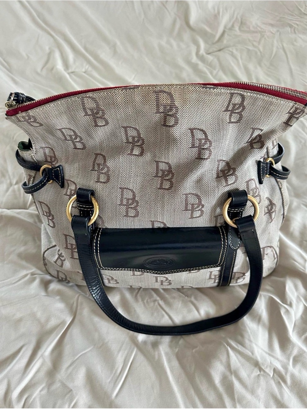 Dooney & Bourke Beige Monogram Shoulder Bag with Black Trim and Red Zip